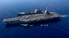 Venezuela’s Maduro says US ‘fabricating war’ as it deploys world’s largest warship