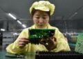 China’s economic growth slows as trade tensions with US flare up