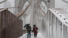 Powerful winter storm slams US north-east as NYC issues travel ban