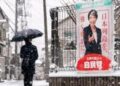 Japanese people brave snow to vote in snap election