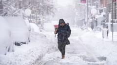 More than 5,000 flights cancelled as US east coast digs out of record snow